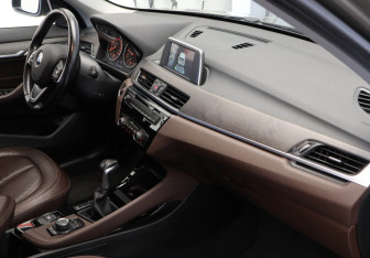 Подержанный автомобиль BMW X1 2016 года (25 фото)