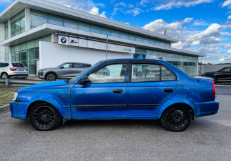 Подержанный автомобиль Hyundai Accent Sedan 2002 года (8 фото)