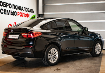 Подержанный автомобиль BMW X4 2015 года (4 фото)