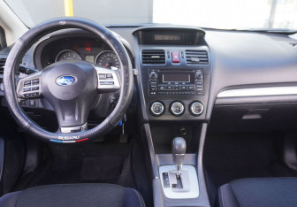 Подержанный автомобиль Subaru XV 2014 года (12 фото)