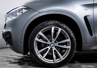 Подержанный автомобиль BMW X6 2016 года (15 фото)