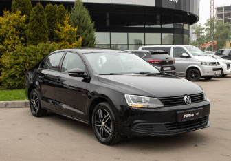Подержанный автомобиль Volkswagen Jetta Sedan 2014 года (2 фото)