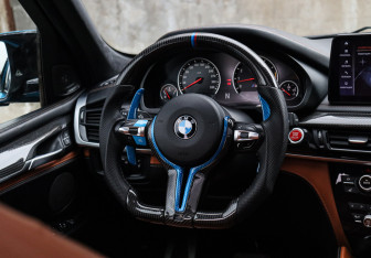 Подержанный автомобиль BMW X5 M 2015 года (14 фото)