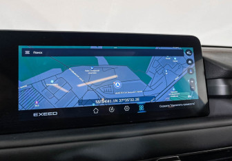 Подержанный автомобиль Exeed TXL 2022 года (18 фото)