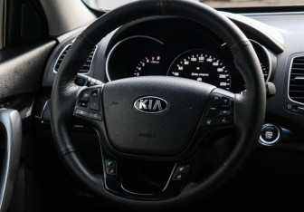 Подержанный автомобиль Kia Sorento 2014 года (11 фото)