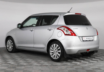 Подержанный автомобиль Suzuki Swift Hatchback 2013 года (7 фото)