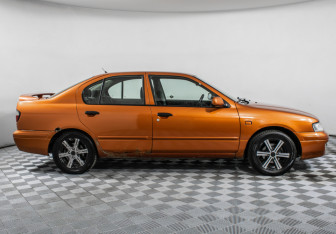 Подержанный автомобиль Nissan Primera Sedan 1996 года (4 фото)