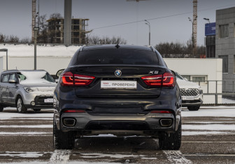 Подержанный автомобиль BMW X6 2018 года (6 фото)