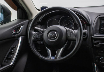 Подержанный автомобиль Mazda CX-5 2014 года (15 фото)