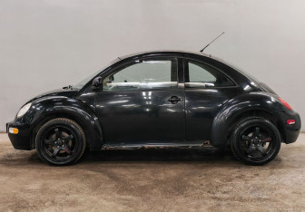 Подержанный автомобиль Volkswagen Beetle Hatchback 1999 года (9 фото)