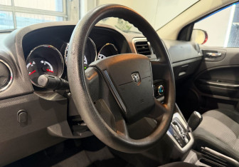 Подержанный автомобиль Dodge Caliber 2010 года (12 фото)