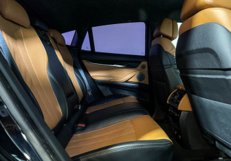 Подержанный автомобиль BMW X6 2016 года (14 фото)