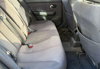 Подержанный автомобиль Nissan Tiida Sedan 2010 года (11 фото)