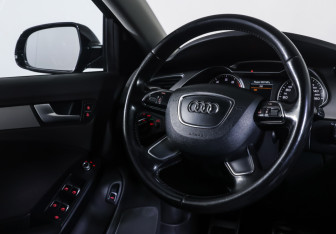 Подержанный автомобиль Audi A4 Sedan 2014 года (12 фото)