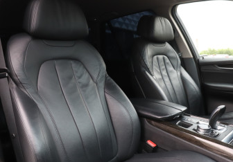 Подержанный автомобиль BMW X5 2014 года (14 фото)