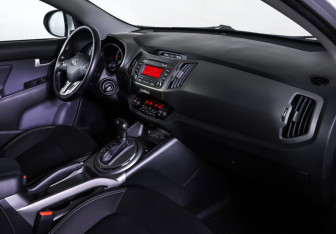 Подержанный автомобиль Kia Sportage 2014 года (11 фото)