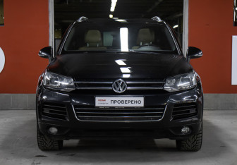 Подержанный автомобиль Volkswagen Touareg 2014 года (2 фото)