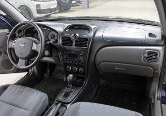 Подержанный автомобиль Nissan Almera Classic 2011 года (11 фото)