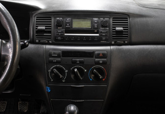 Подержанный автомобиль Toyota Corolla Sedan 2006 года (15 фото)