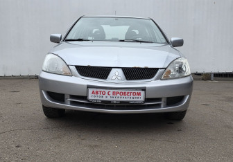 Подержанный автомобиль Mitsubishi Lancer Sedan 2009 года (2 фото)