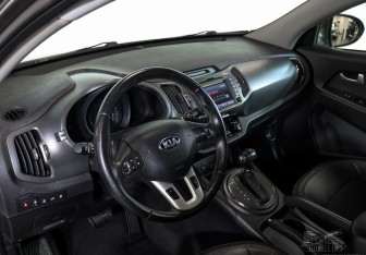 Подержанный автомобиль Kia Sportage 2013 года (9 фото)