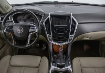 Подержанный автомобиль Cadillac SRX 2013 года (13 фото)