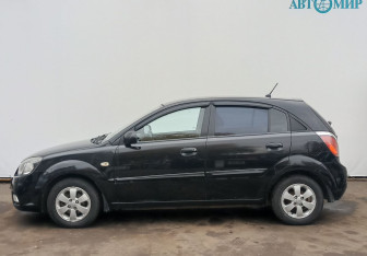 Подержанный автомобиль Kia Rio Hatchback 2011 года (8 фото)