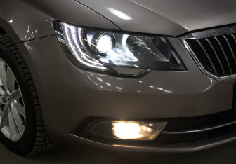 Подержанный автомобиль Skoda Superb Liftback 2014 года (24 фото)