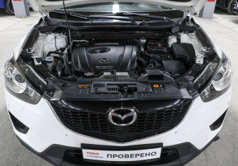 Подержанный автомобиль Mazda CX-5 2014 года (9 фото)