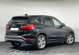 Подержанный автомобиль BMW X1 2017 года (2 фото)