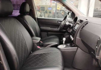 Подержанный автомобиль Nissan X-Trail 2011 года (10 фото)