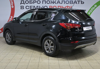 Подержанный автомобиль Hyundai Santa Fe 2014 года (6 фото)