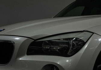 Подержанный автомобиль BMW X1 2011 года (8 фото)