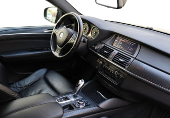 Подержанный автомобиль BMW X6 2013 года (10 фото)
