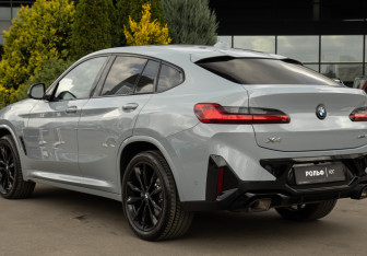 Подержанный автомобиль BMW X4 2024 года (28 фото)