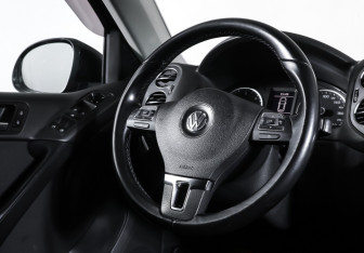 Подержанный автомобиль Volkswagen Tiguan 2013 года (13 фото)