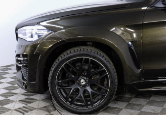 Подержанный автомобиль BMW X6 2015 года (8 фото)