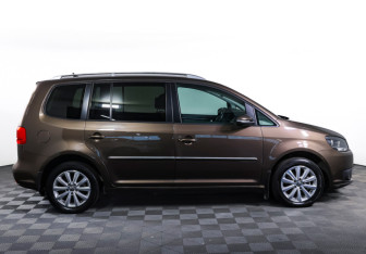 Подержанный автомобиль Volkswagen Touran 2013 года (4 фото)