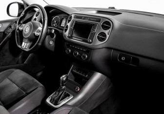 Подержанный автомобиль Volkswagen Tiguan 2016 года (11 фото)