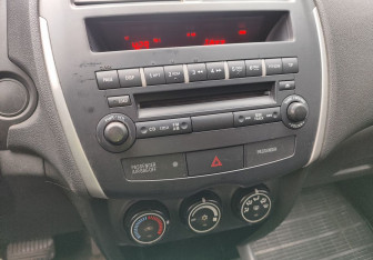 Подержанный автомобиль Mitsubishi ASX 2012 года (14 фото)