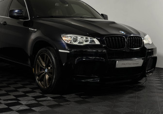 Подержанный автомобиль BMW X6 M 2012 года (23 фото)