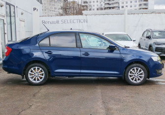 Подержанный автомобиль Skoda Rapid Liftback 2014 года (4 фото)