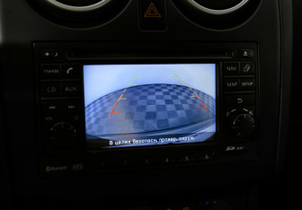 Подержанный автомобиль Nissan Qashqai 2013 года (11 фото)