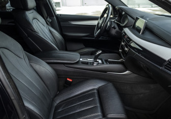 Подержанный автомобиль BMW X6 2018 года (10 фото)