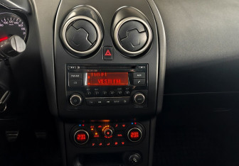 Подержанный автомобиль Nissan Qashqai+2 2012 года (15 фото)