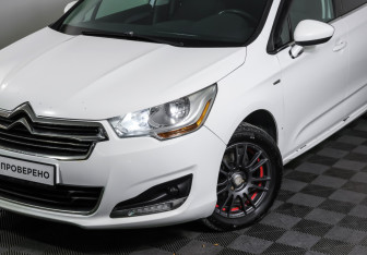 Подержанный автомобиль Citroen C4 Sedan 2014 года (22 фото)