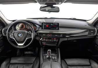 Подержанный автомобиль BMW X6 2016 года (14 фото)
