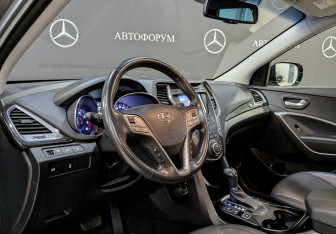 Подержанный автомобиль Hyundai Santa Fe 2014 года (15 фото)