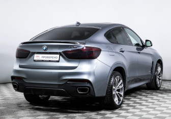 Подержанный автомобиль BMW X6 2016 года (5 фото)