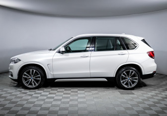 Подержанный автомобиль BMW X5 2014 года (8 фото)